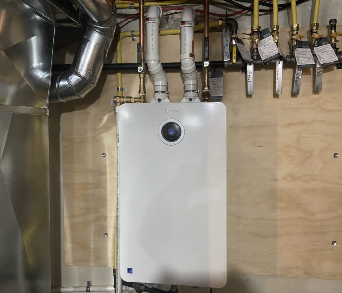 An on demand water heater installed in a home by Titan General
